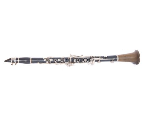 A Boosey & Hawkes '77' clarinet, serial number '154798', 67cm long.