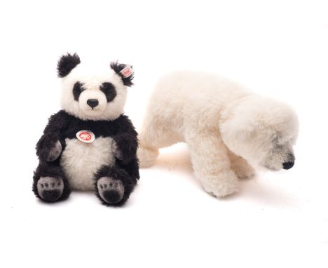 A group of two boxed Steiff bears, including Knut 33cm, and Bamboo 26cm, together with an unboxed Siro 40cm . (3)