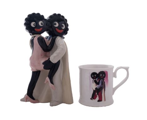 A Royal Nostalgia Ware/ Carlton Ware. A limited edition' Golly Tabgo Teapot' 11/50 together with matching cup (2)* These item