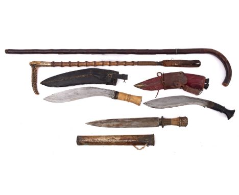 A bone handled Kukri, together with one other , also a Far Eastern dagger in plated scabbard, a Customs stick and a silver mo