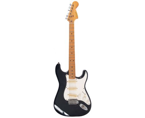 Hohner (Japan) A Stratocaster style electric guitar, maple neck and headstock with dot inlay fret markers, black body with wh