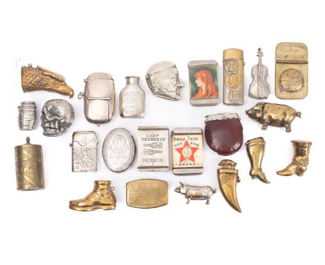 A collection of twenty-two various brass and silver plated novelty and advertising vesta cases, including  a skull, a pig, a 