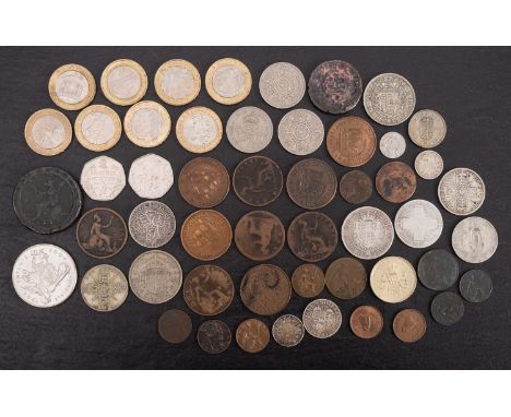 A group of coins, including British silver 1895 Half crowns, 1888 Florin, 1934 New Zealand Half crown, Five pound 2004 coin, 