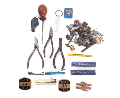 Three BR ticket punches, together with two GPO enamel badges a BR black Bakelite whistle and miscellaneous items. 