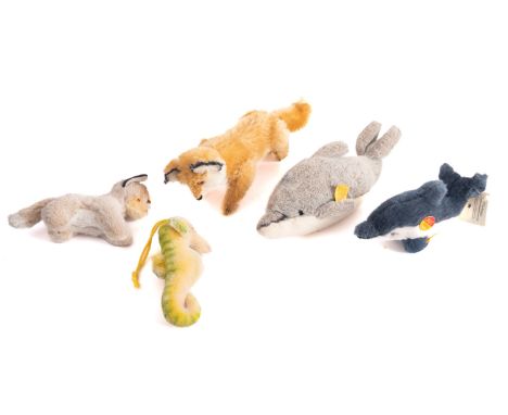 A group of five Steiff animals, including a  dolphin 'Clippy' a seahorse 'Swimmy', with two foxes, the larger of the two a mo