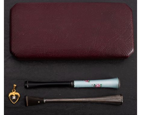 Alfred Dunhill, London. A silver cigarette holder, signed as per title with black mouthpiece , together with a silver an enam