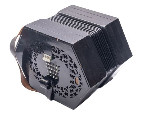 An early 20th century ebony thirty-six key concertina, unsigned , serial number '24681', with fret cut ends black leather bel