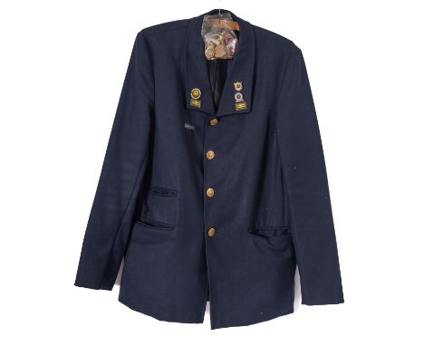 A BR blue cloth jacket together with a collection of ASLEF and Railway related enamel badges.