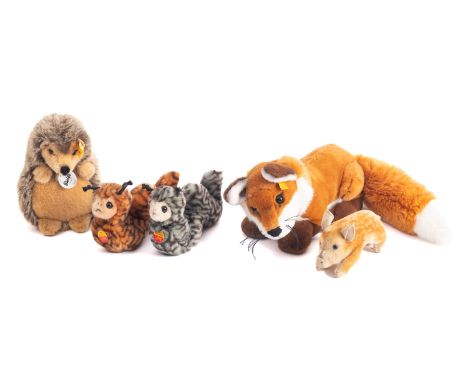 A group of five Steiff animals, including 'Ferdy', 'Joggi', two 'Cosy Fluppy', and a piglet. (5)
