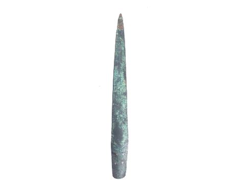 A Bronze Age dagger, the straight double edged blade with six locating holes to tang, 21.5cm long