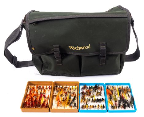 A Wychwood Fly Fishing bag, two plastic boxes of Salmon flies a spring balance and other items