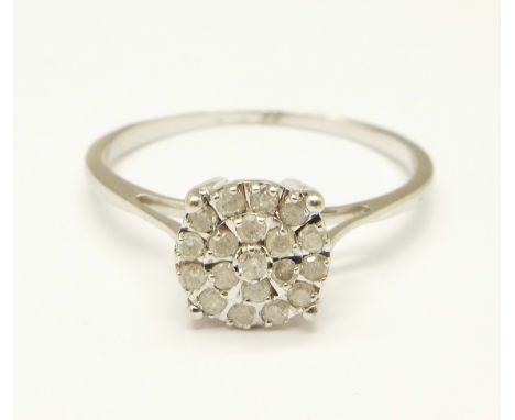 A 9ct gold diamond cluster ring, mark worn, 1.8g, R 