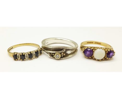 A silver and diamond ring, P, and two 9ct gold rings including opal and amethyst, (9ct 4.9g, N and M) 