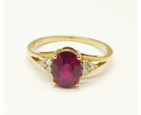 A 9ct gold, red stone and diamond ring, 1.9g, N 