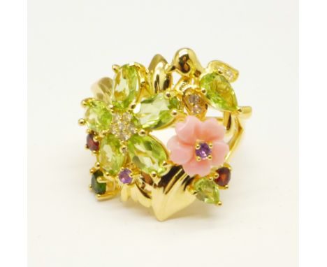 A silver gilt, carved pearl, amethyst, Russian diopside, garnet and zircon ring, O 