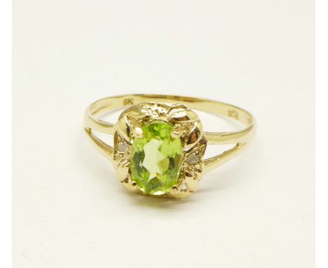 A 9ct gold, peridot and diamond ring, 1.2g, O 