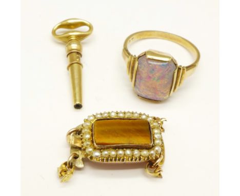 A 9ct gold ring, 2.2g, K, a watch key and a fastener 