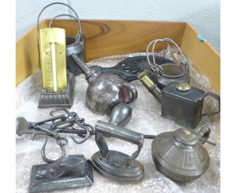 A collection of cast iron items including a thermometer, a Well's Unbreakable Moulders lamp, etc. 