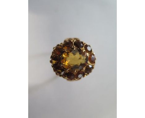 A 9ct yellow gold cluster ring size M - approx weight 5 grams 