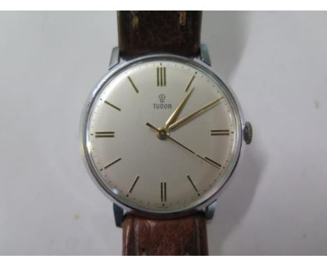 A Tudor stainless steel manual wind wristwatch - case number 1755 - 34mm case - on a leather strap - not currently running 