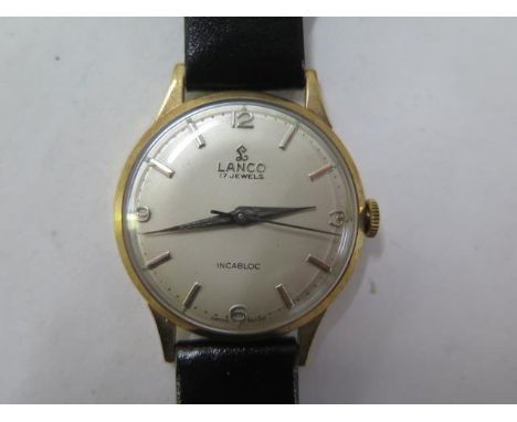 A Lanco 17 jewel 9ct yellow gold manual wind Incabloc gents wristwatch on a leather strap - 32mm case - running, hands adjust