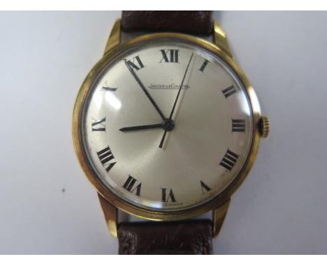 A 9ct yellow gold Jaeger leCoultre manual wind wristwatch - 31mm case - approx weight 26 grams - not currently working 