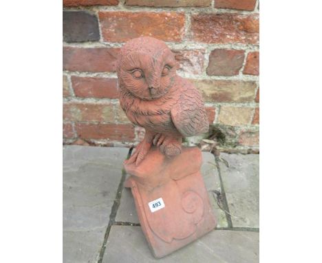 A barn owl roof ridge cast stone finial on a V 90 degree tile - Length 18cm x Width 22cm x Height 45cm 