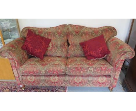 A Duresta two seater Mayfair medium sofa in gold elite fabric - in good condition with scatter cushions - Width 180cm x Heigh