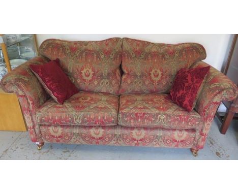 A Duresta two seater Mayfair medium sofa in gold elite fabric - in good condition with scatter cushions - Width 180cm x Heigh