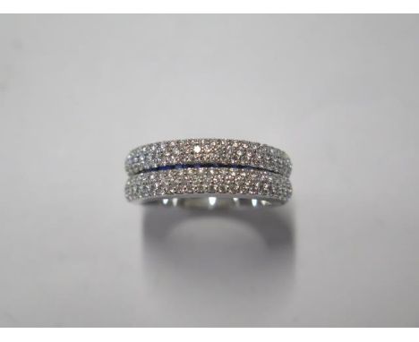 An unusual 18ct white gold hinged diamond and sapphire ring approx 125 diamonds and 8 sapphires, ring size approx M - head si