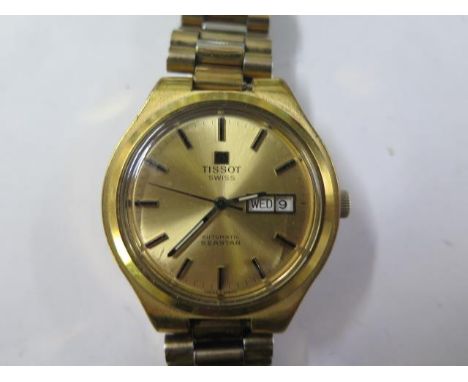 A Tissot automatic Seastar gold plated watch - 36mm dial - on a bracelet  strap, running, dial good 