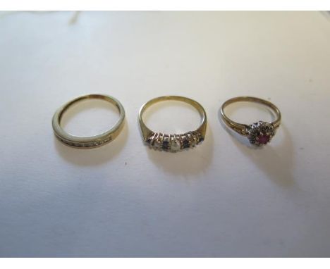 Three 9ct yellow gold rings sizes K and Q - approx weight 5.2 grams 