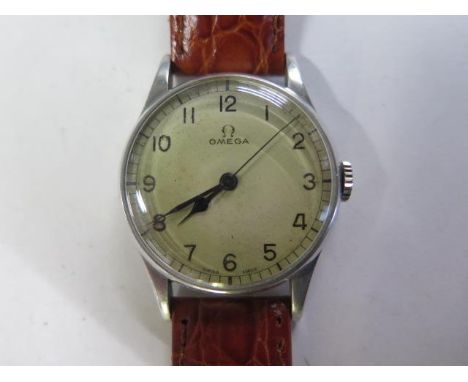 An Omega Military stainless steel manual wind wristwatch - 32mm case - running, hands adjust, some wear to dial, case good 