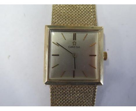 An Omega 9ct yellow gold bracelet manual wind wristwatch 25mm case, approx 55 grams, in running order, catch good, dial good,