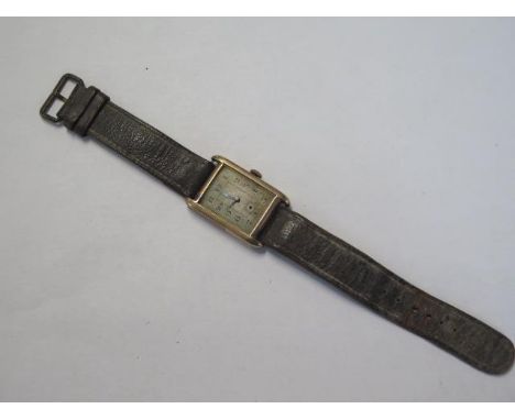 A 9ct yellow gold B.W.C gents dress watch, manual wind - 25mm case - running, no glass, no second hand case and strap approx 