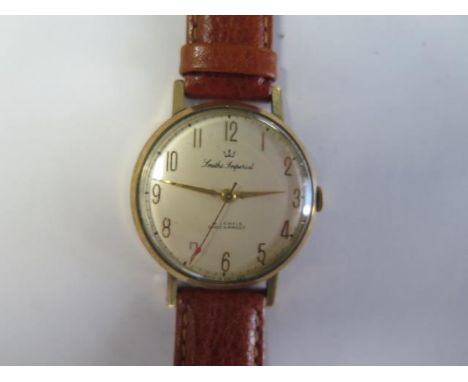 A 9ct yellow gold Smiths Imperial manual wind 19 jewel wristwatch - 33mm case - running, hands adjust, approx weight 35 grams