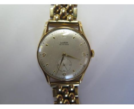 A 14ct yellow gold Silvana manual wind bracket gents wristwatch - 32mm case - weight without movement approx 33 grams - runni
