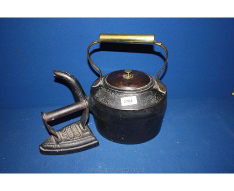 A Cannon cast iron Kettle and Flat Iron marked No. 7 Cannon 1900.