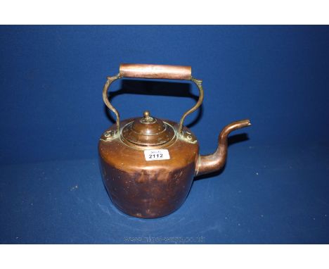 An old Copper Kettle with makers mark to base.