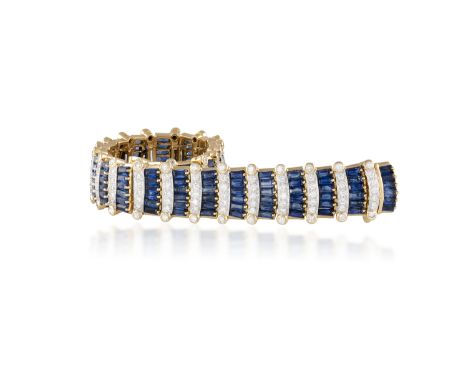 A FINE SAPPHIRE AND DIAMOND BRACELET, BY MOUAWADThe highly flexible bracelet designed as a series of fan-shaped links, each l