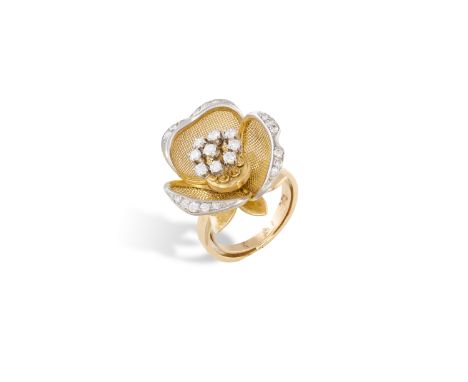 A DIAMOND FLOWER DRESS RING, CIRCA 1960Modelled as a rose in bloom, the round brilliant-cut diamond pistils set at the centre