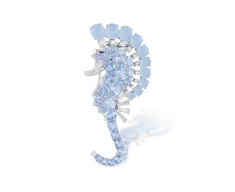 AN ELEGANT GEM-SET BROOCH, BY SEAMAN SCHEPPSDesigned as a seahorse, the body accentuated with circular and oval-shaped aquama