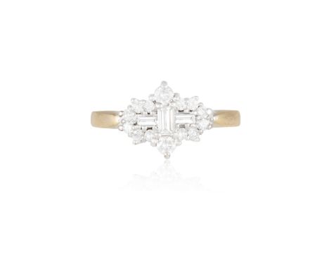 A DIAMOND RINGSet with a trio of baguette-cut diamonds to the front, within a frame of round brilliant-cut diamonds, mounted 