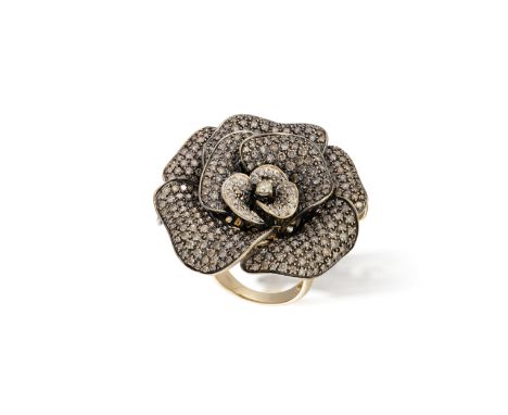 A DIAMOND FLOWER COCKTAIL RING/PENDANT/BROOCHDesigned as a camellia rose flowerhead, the petals set with circular-cut diamond