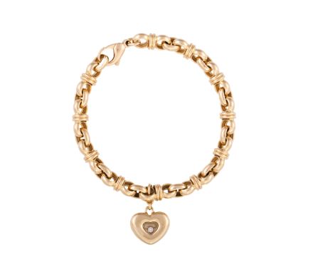 A 'HAPPY DIAMOND' BRACELET, BY CHOPARDThe yellow gold fancy-link bracelet suspending a glazed heart-shaped charm, containing 