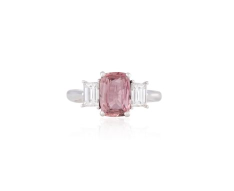 A PADPARADSCHA SAPPHIRE AND DIAMOND RINGThe cushion-shaped padparadscha sapphire weighing 2.08cts, between rectangular-cut di