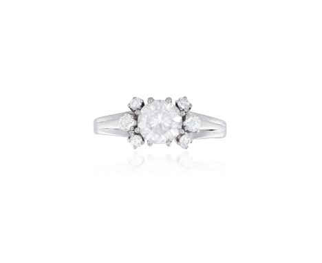 A SINGLE-STONE DIAMOND RINGThe round brilliant-cut diamond weighing 1.00ct, within a multiple-claw setting and between round 