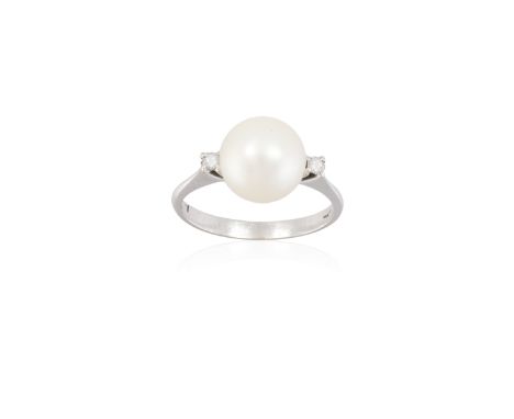 A CULTURED PEARL AND DIAMOND RINGThe cultured pearl of cream tint measuring approximately 10.07x9.37mm between round brillian