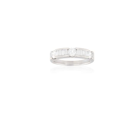 A DIAMOND HALF-ETERNITY RINGSet with alternating baguette and round brilliant-cut diamonds, mounted in 18K gold, diamonds app