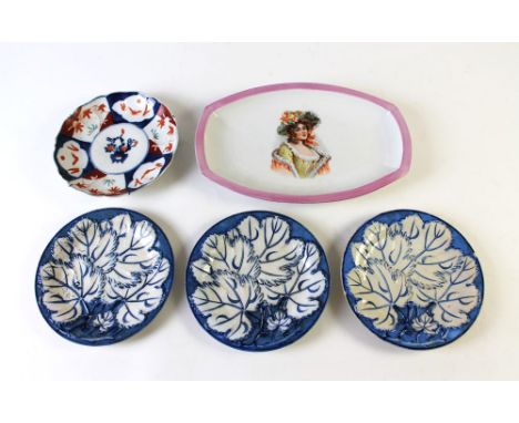 Three 19th century cabbage leaf patterned plates. Diameter 22 cm, together with an Imari plate, transfer printed shaped Bavar